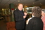 Bert Newton meets two admirers in the waiting area