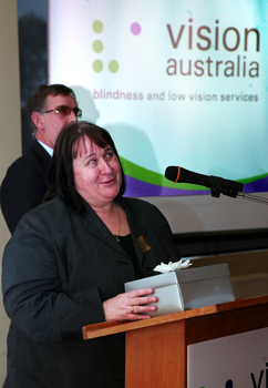 Maryanne Diamond speaking at the podium