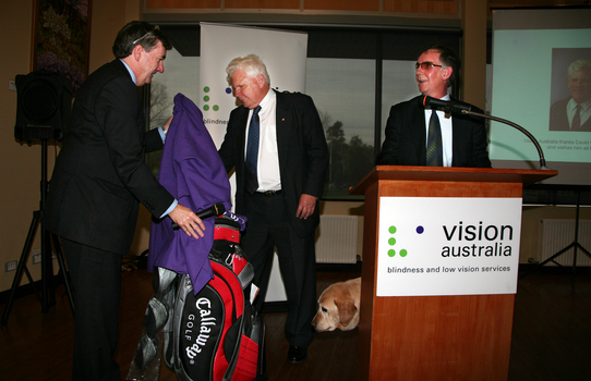 David Blyth presented with his gift of golf clubs from Gerard Menses and Dr Kevin Murfitt