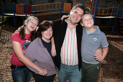 Tony Clarke with his wife, son and daughter in a playground
