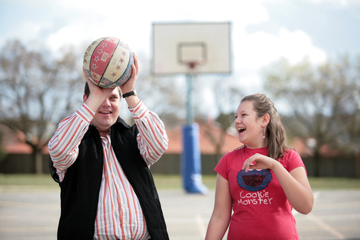 Tony Clarke looking to make a hoop whilst his daughter doubts its accuracy