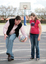 Tony Clarke looking to do a trick bounce whilst his daughter looks on at his showing off