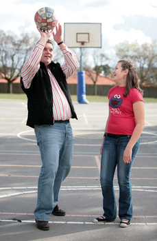 Tony Clarke looking to make a hoop whilst his daughter doubts its accuracy