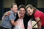 Tony Clarke with his son and daughter in a school yard