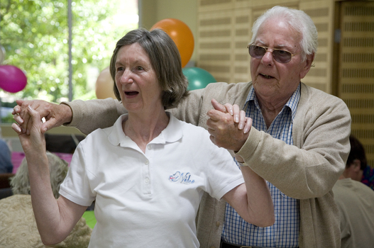 Kooyong Day Centre clients and staff join in the dance