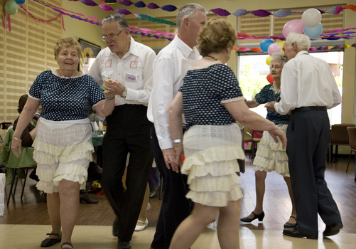 Square dancing ladies in their bloomers as they dance