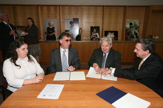 Nadia Mattiazzo, Dr Kevin Murfitt, BCA person and Gerard Menses signing the memorandum