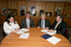 Nadia Mattiazzo, Dr Kevin Murfitt, BCA person and Gerard Menses signing the memorandum