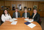 Nadia Mattiazzo, Dr Kevin Murfitt, BCA person and Gerard Menses signing the memorandum