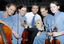 Gerard Gosens with schoolgirls orchestra members