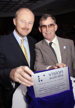 Nick Carter and Kevin Murfitt with the plaque commemorating the amalgamation