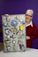 Woman with a mosaic of teacups