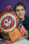 Boy with drawing of face and torso