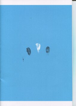 Two black fingerprints and one white fingerprint on a blue background