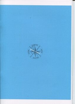Compass markings in black with white needle on blue background