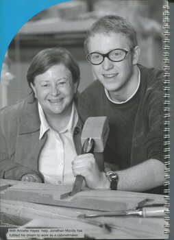 Jonathan Mondy using a chisel as Annette Hayes looks on
