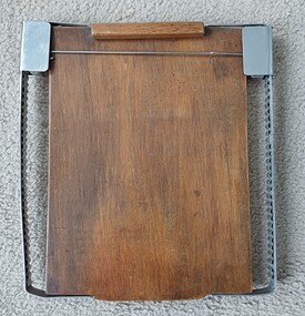 Wooden board with wooden clip and metal flanges for metal alignment rod