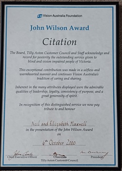 White parchment paper with blue border and header and black writing