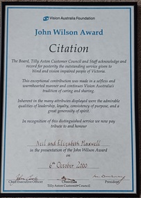 White parchment paper with blue border and header and black writing