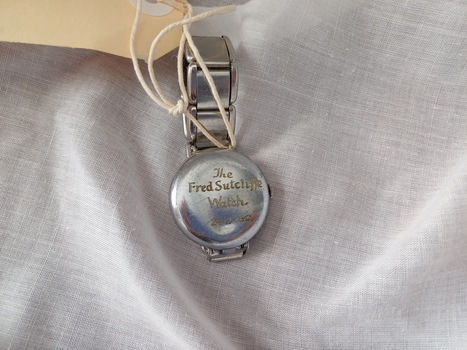 Watch cover with engraving 'The Fred Sutcliffe Watch 24-2-60'