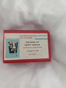 Red box with RNIB label 'The game of happy families'