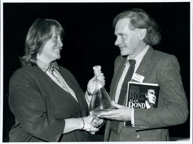 Wilma Bedford presenting award to Paul Karo