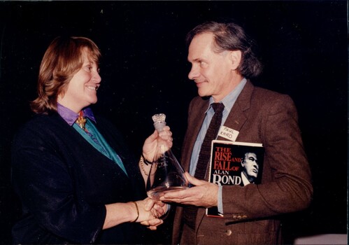 Wilma Bedford presenting award to Paul Karo