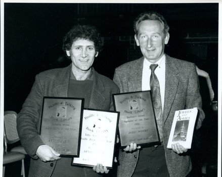 Arnold Zable and James Wright with plaques and book