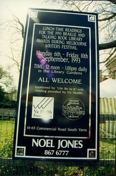 Signboard announcing reading session outside Commercial Road building