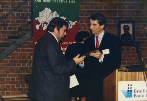 Jeremy Wurm presents Tim Curnow with Ruth Park's award