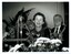 Rose Blustein at the podium with Beverley Dunn and Blanche d'Alpuget behind her