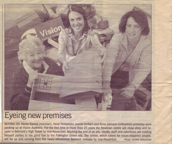 Newspaper article with photograph of three women with storage boxes