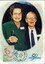 Older female and male smiling with Spastic Centre of Victoria logo and postage stamp