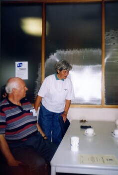 Shirley Admans speaking with party attendees