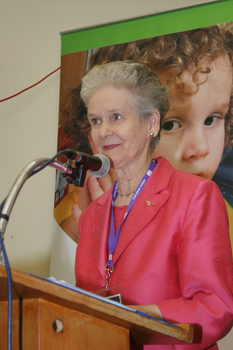 Marjorie West at the podium