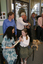 Marina Prior and her daughter, Graeme Turner, Michael Simpson and Kevin Murfitt pull crackers whilst Colleen Thom looks on