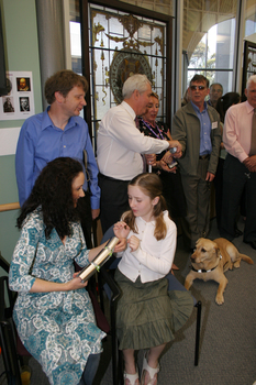 Marina Prior and her daughter, Graeme Turner, Michael Simpson and Kevin Murfitt pull crackers whilst Colleen Thom looks on