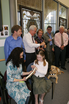 Marina Prior and her daughter, Michael Simpson and Kevin Murfitt pull crackers whilst Colleen Thom and David Blyth look on