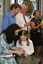 Graeme Turner, Michael Simpson and Colleen Thom at rear, Marina Prior and daughter in front