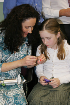 Marina Prior and her daughter with the Christmas cracker