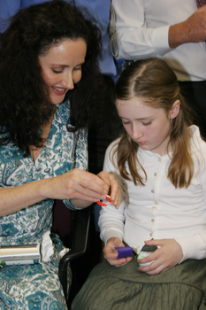 Marina Prior and her daughter with the Christmas cracker