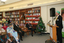 Audience members in the browsing library listening to Graeme Innes