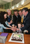 Marina Prior, Reuben Ryan, Tony Shepherd, Graeme Innes, Greg McKibbin and Jarryd Clifford cut the cake