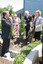 Gerard Menses, Reuben Ryan, Jarryd Clifford and Jennifer Gibbons bury the time capsule
