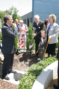 Gerard Menses, Reuben Ryan, Jarryd Clifford and Jennifer Gibbons bury the time capsule
