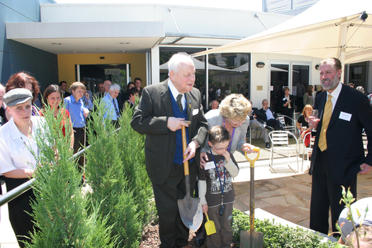 ?, Jarryd Clifford and Jennifer Gibbons bury the time capsule with Graeme Innes (R) and Joanne (L) look on