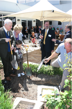  ?, Jarryd Clifford and Jennifer Gibbons watch the gardener caulk the covering plate, with Graeme Innes and Gerard Menses