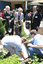  ?, Jarryd Clifford and Jennifer Gibbons watch the gardener caulk the covering plate with Peter North and Graeme Innes