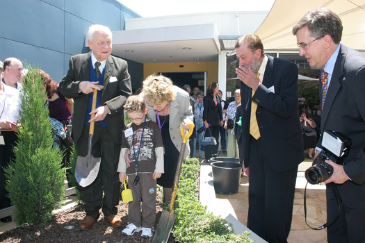 Reuben Ryan, Jarryd Clifford and Jennifer Gibbons at the burying of the time capsule, with Graeme Innes and Gerard Menses