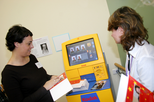 Demonstrating how the kiosk works